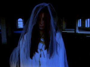 A ghostly looking woman
